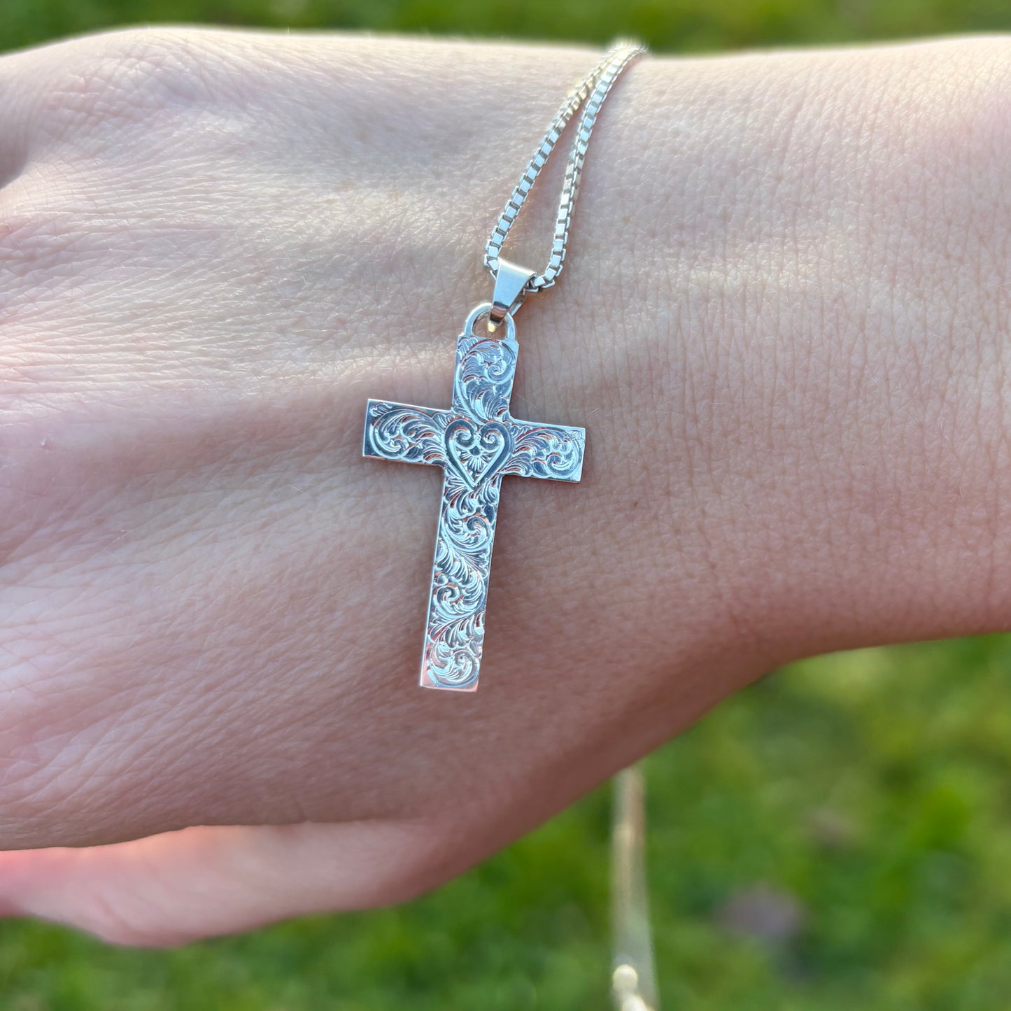Silver cross pendant with hand engraving