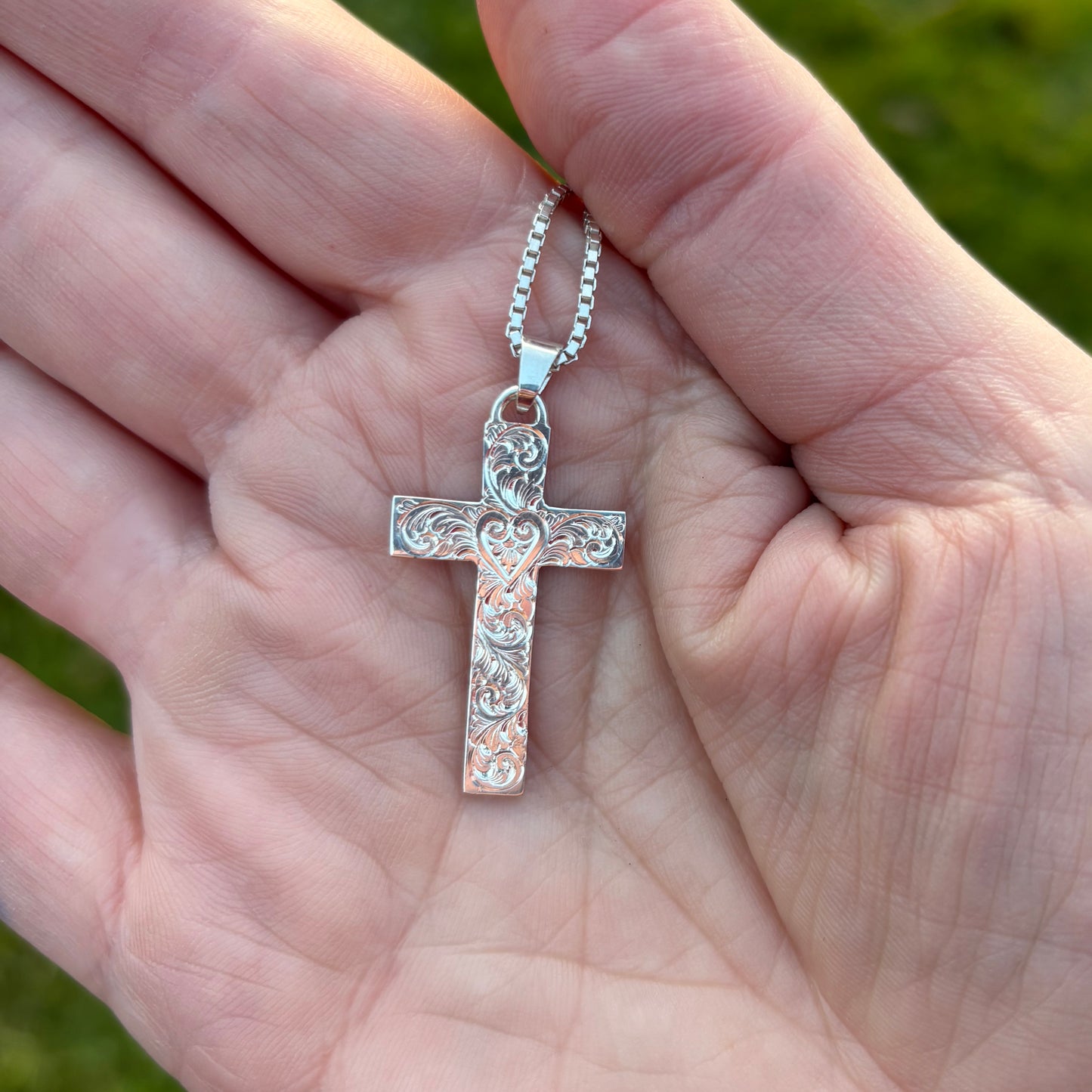 Silver cross pendant with hand engraving