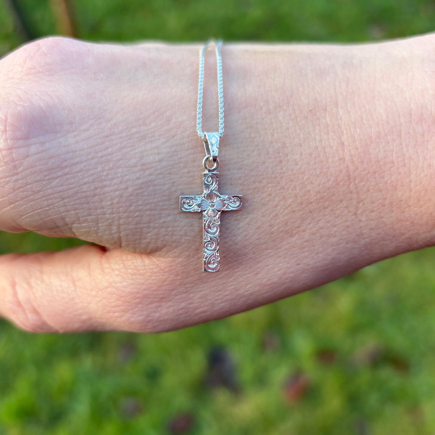 Small silver cross  pendant with hand engraving