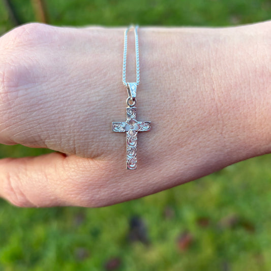 Small silver cross  pendant with hand engraving