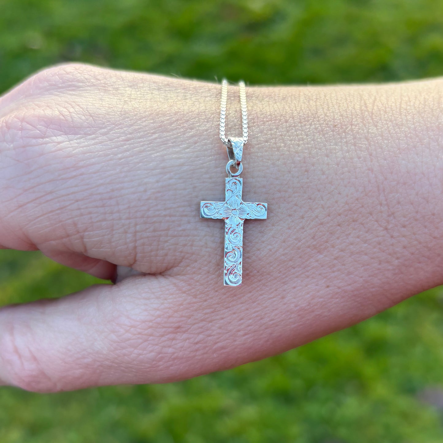 Small silver cross  pendant with hand engraving
