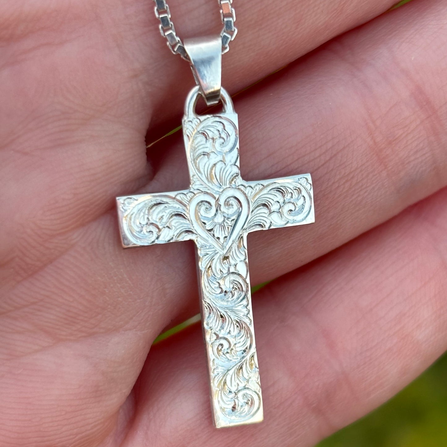 Silver cross pendant with hand engraving