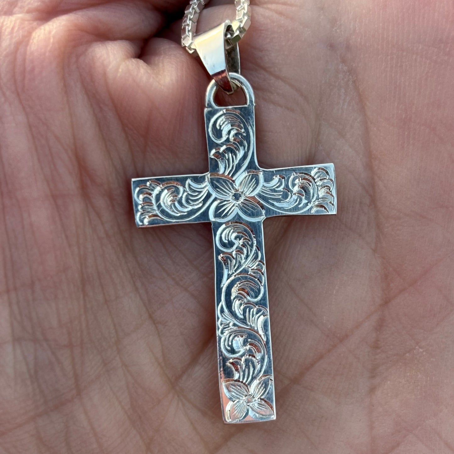 Silver cross pendant with hand engraving