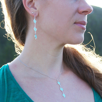 Three´sa charm earrings